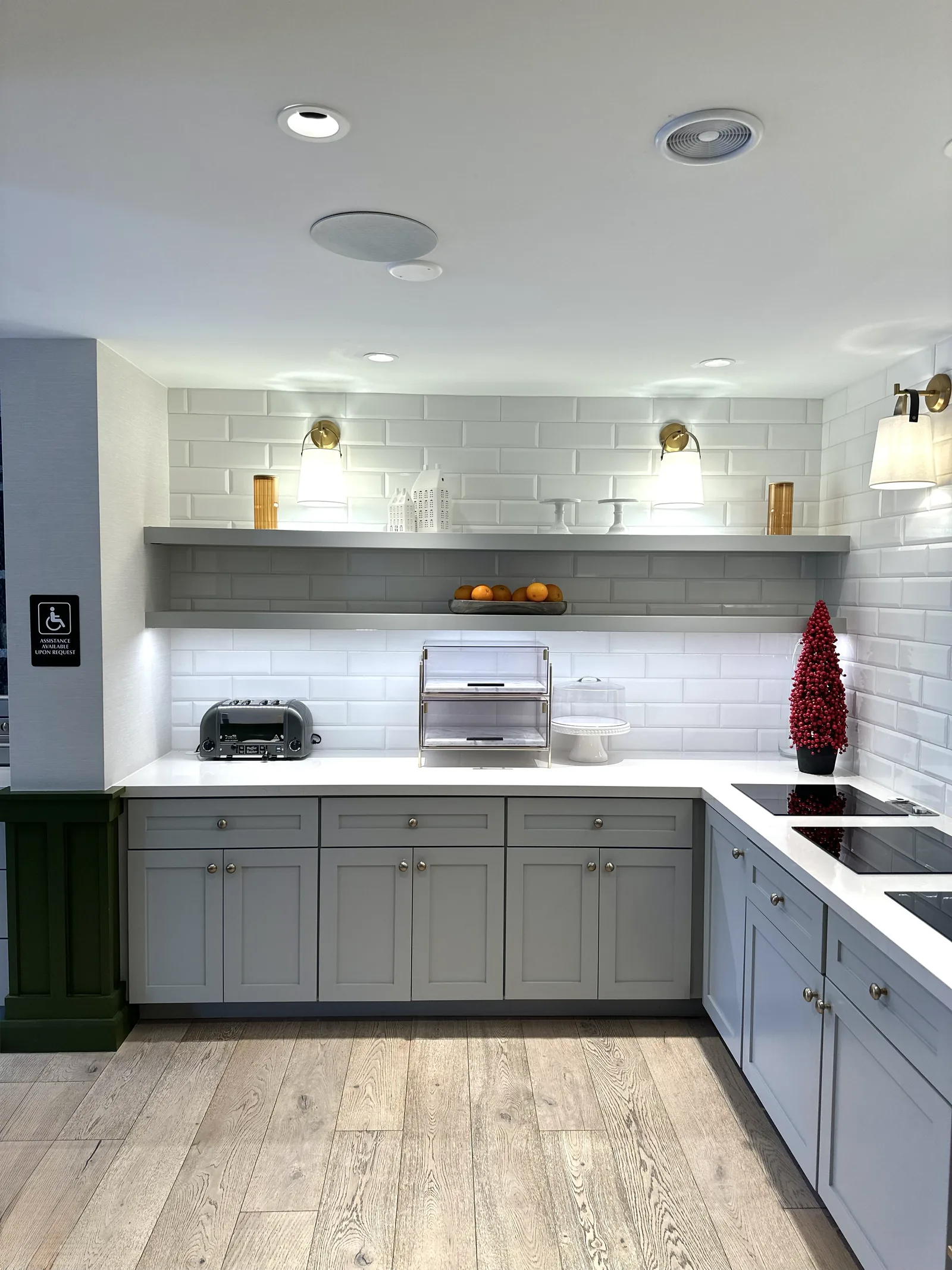 Commercial breakroom kitchenette with quartz counters and subway tile in Atherton