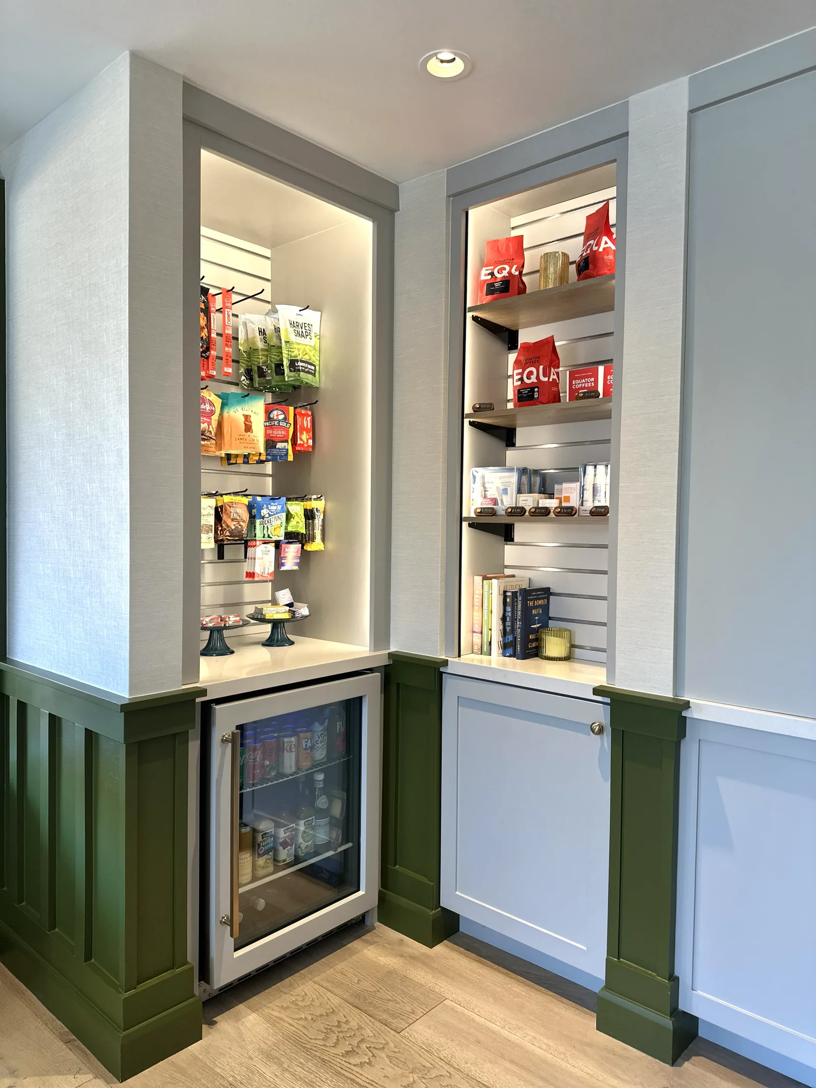 Office pantry with display shelving and a built-in beverage cooler in Atherton