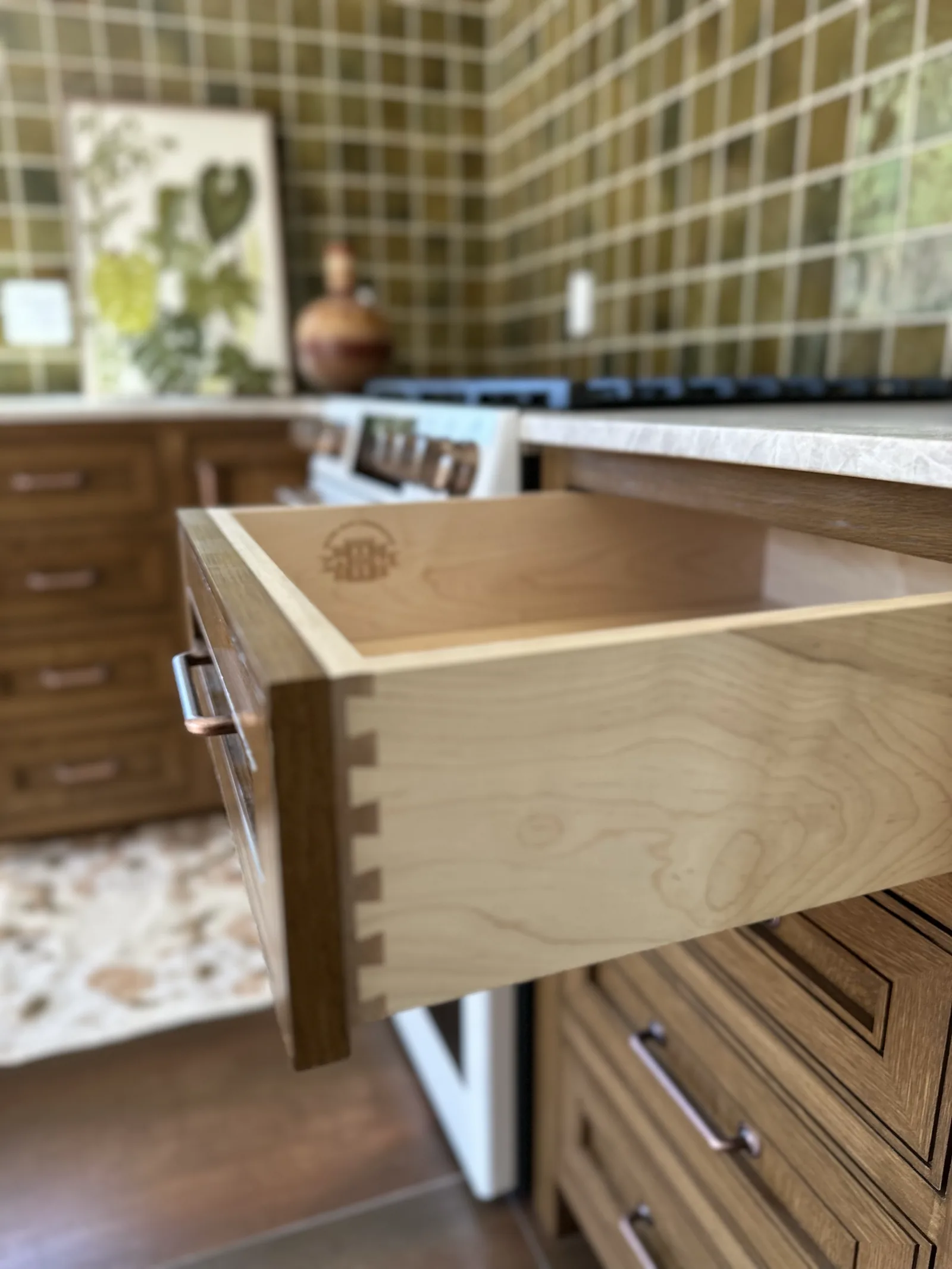 Close-up of a dovetail joined drawer box in premium plywood built by BMC