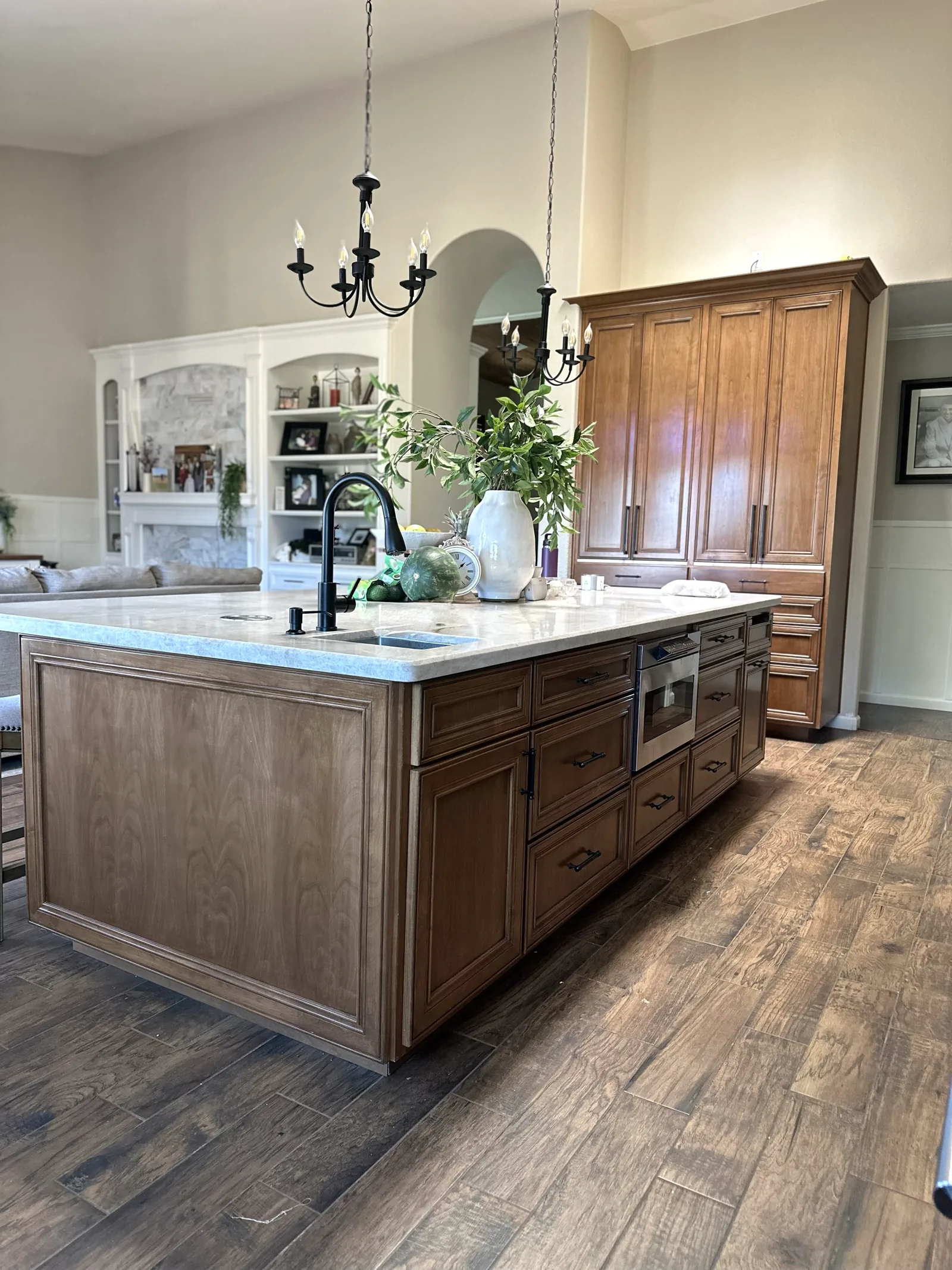 Traditional kitchen with a large stained wood island in Soledad